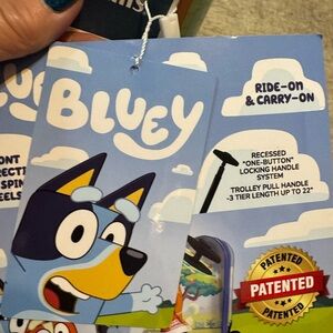 Lucy Bluey Ride-On Suitcase with Spinner Wheels